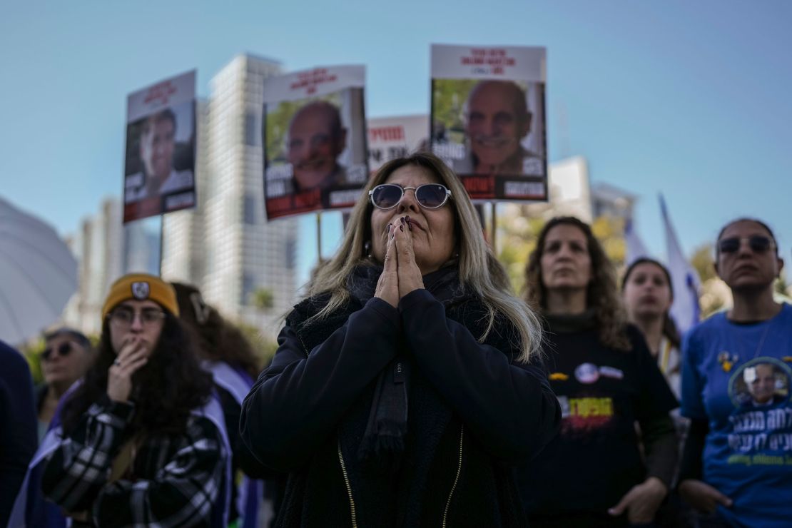 Israelis gather at Hostages Square in Tel Aviv, waiting for the release of Sagui Dekel-Chen, Alexandre Troufanov and Iair Horn on Saturday.